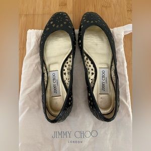 Jimmy Choo flats. Black laser-cut patent leather.
